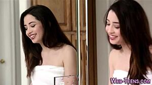 petite teen ager tasting her skinny young friend's small tits and ass in kissing oral session