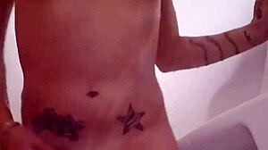 emy angel takes a shower while masturbating her petite pussy