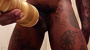 Hallelujah Johnson uses gold fleshlight in bdsm
