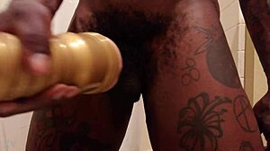 Hallelujah Johnson uses gold fleshlight in bdsm