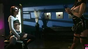 One lesbian lady with fake tits is playing with her lesbian friend