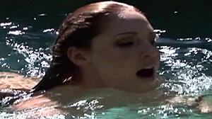 Lauren Phoenix Rests on a Black Seat in Fishnets and Heels