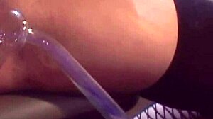 One lesbian lady with fake tits is playing with her lesbian friend