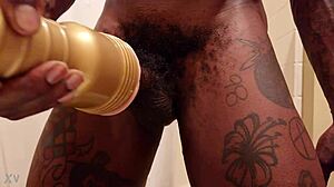 Hallelujah Johnson uses gold fleshlight in bdsm