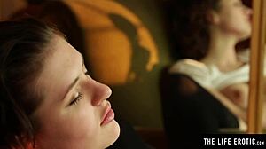 Black stockings tease as she fingers herself wild