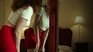 Black stockings tease as she fingers herself wild