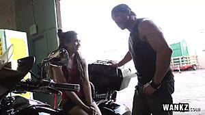 Suggestive scene of a bad girl teen seducing her mechanic with hardcore action.