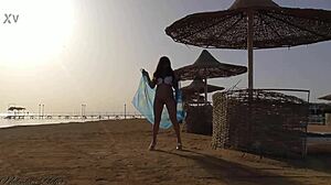 hey, i'm flashing my big tits and going pantyless on this public beach