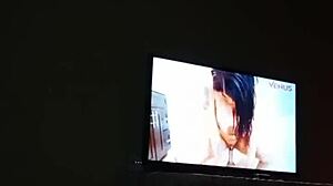 we started watching porn and she massaged my dick until i came all over