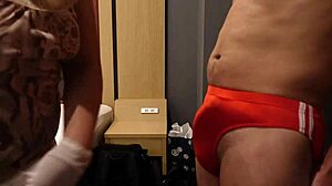 femdom bitch slaps erect cock over bloomers