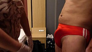 femdom bitch slaps erect cock over bloomers