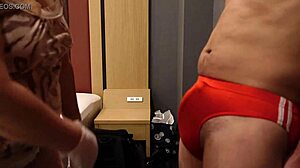 femdom bitch slaps erect cock over bloomers