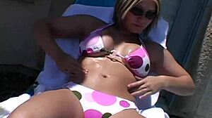 Paige Applies Lotion Outdoors Under Sunshine