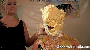 Two blondes get wet and messy while smoking and masturbating, ending with a pie in the face