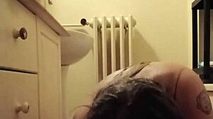 Female slave in bdsm self-session with chains