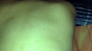 Bent over in doggystyle position, contrasting pleasure and submission