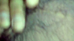 Bent over in doggystyle position, contrasting pleasure and submission