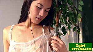 Solo ladyboy gets wet in bath then strokes her hard cock in lingerie