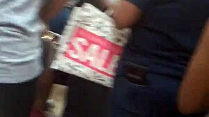 Hidden in the shop, she folds her ass for the voyeur