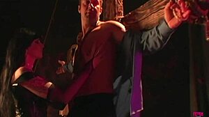 a foxy vixen into bdsm ties up her man in latex and leather, gives blowjob, and makes him cum