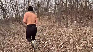 Teen strips naked and fucks in forest