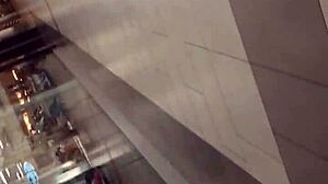 Hidden in the shop, she folds her ass for the voyeur