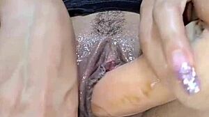 This Colombian redhead masturbates with a dildo, showing big tits and ass in anal fun