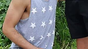 In the field, she sucked the endowed farmer while his friend filmed the public act.