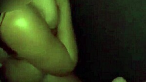 Wife rubbing black guy's cock on her pussy without condom in glory hole at swing house