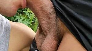 In the field, she sucked the endowed farmer while his friend filmed the public act.