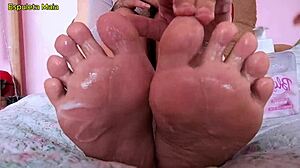 Hot Brunette Applies Cream to Her Soft Feet While Smoking