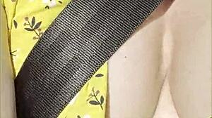 Wifey flashes her perfect big tits while driving in the car, getting all exhibitionist outdoors!