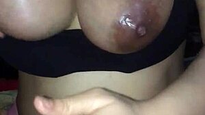 Wife gives intense handjob to big tits