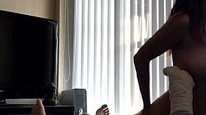 Hey, check out this asian with big tits riding a cock!