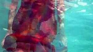 i adore redhead babe nikita vodorezova stripping naked underwater in pool