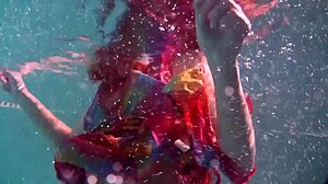 i adore redhead babe nikita vodorezova stripping naked underwater in pool
