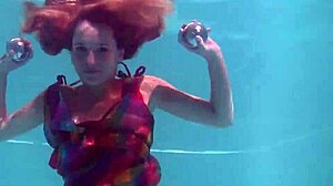 i adore redhead babe nikita vodorezova stripping naked underwater in pool