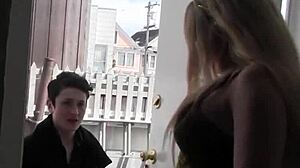 blonde with big tits handcuffs her brunette lesbian friend and fucks her with strapon