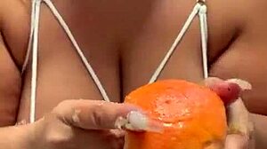 Watch this curvy BBW enjoy fruit fetish fun