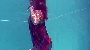 i adore redhead babe nikita vodorezova stripping naked underwater in pool