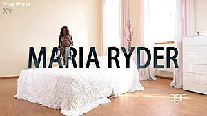 Black beauty intensely masturbates with pink toy in bedroom lingerie.