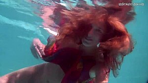 i adore redhead babe nikita vodorezova stripping naked underwater in pool
