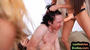 Sissy guy takes strapon from nasty femdom babes?