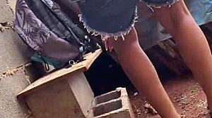 Young brunette leaves school for street encounter with construction worker.