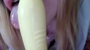 Blonde femdom gets cum on lip after dildo play