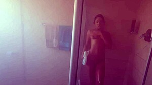 Amateur Girl Soaps Up Her Body in the Shower, Revealing Pierced Nipples