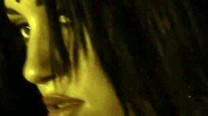 Beautiful brunette undresses gracefully in an erotic dance