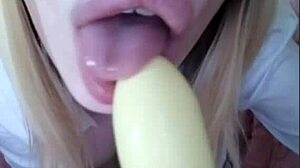 Blonde femdom gets cum on lip after dildo play