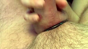 giving a handy handjob to this big cock up close