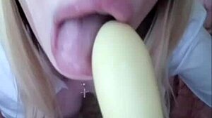 Blonde femdom gets cum on lip after dildo play
